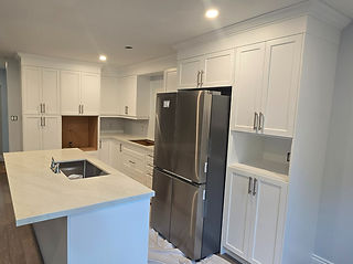 Custom Kitchen with built in wall oven, microwave and stove top. Kitchen Island with seating