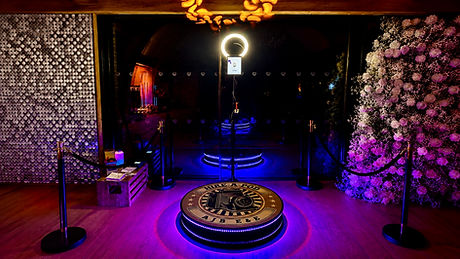 360 video booth hire with LED platform and velvet rope barriers