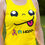 Thumbnail: front of bright yellow racer vest with smiley face and run happy text