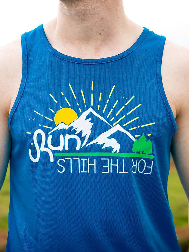 close up of bright blue active top with mountain design