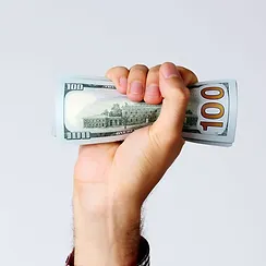 hand holding money