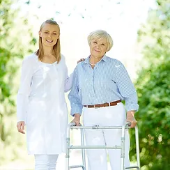 nurse and woman with walker