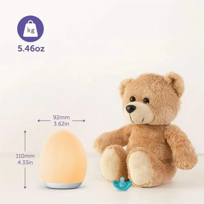 Teddy bear next to an egg-shaped night light, 5.46oz, 92mm, 130mm, 4.33in, 3.62in.
