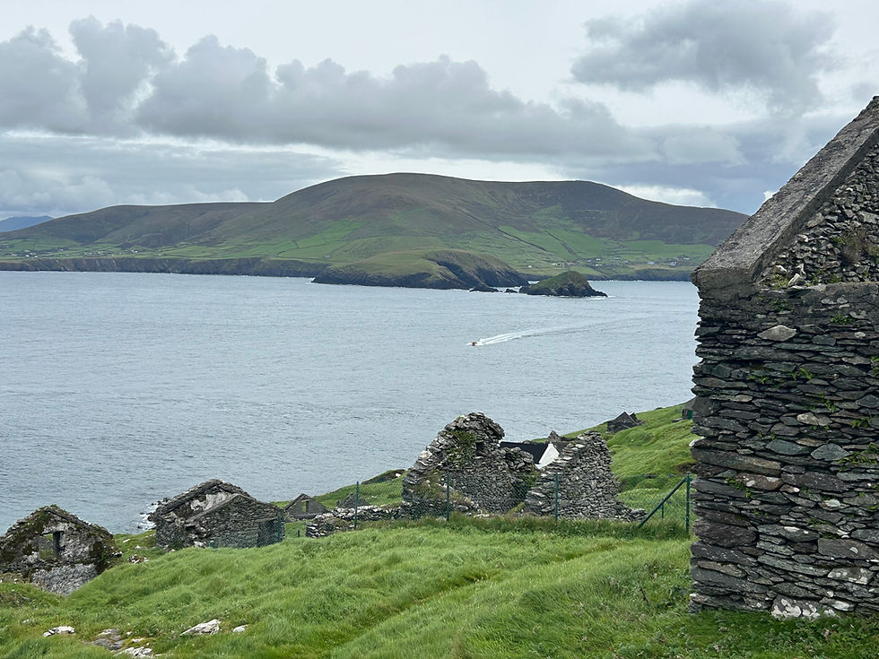 Past the stone ruins of former homes, a thin white surf line appears. It's my boat ride home. Don't miss it. Time to descend.