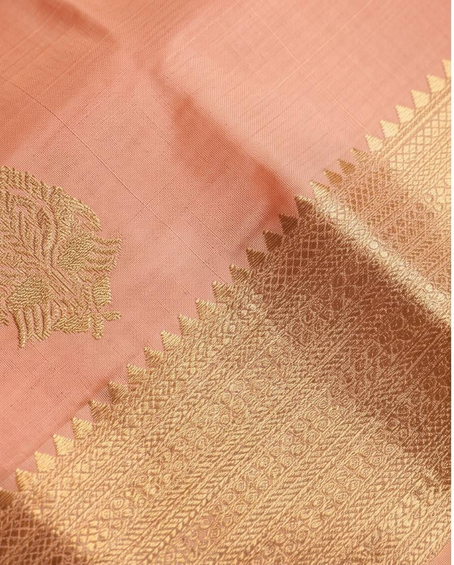 Thumbnail: Close-up of peach Pure Kanchipuram silk with gold zari border