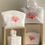 Miniature : PETITE TROUSSE "corail"