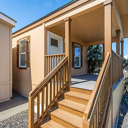 The CM-2602B is a beautifully designed 2-bedroom, 2-bath manufactured home offering 747 square feet of comfortable living space. This thoughtfully crafted floor plan features an open-concept layout with a modern kitchen showcasing granite countertops, stainless steel appliances, ample cabinetry, and quality finishes throughout. The spacious primary suite includes a private bathroom, while Energy Star-certified construction, Low-E dual-pane windows, architectural shingles, and durable Cemplank siding provide lasting value and energy efficiency. Combining style, comfort, and affordability, the CM-2602B is an excellent choice for homeowners seeking a modern and functional home.