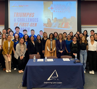 isabel in a photograph with students