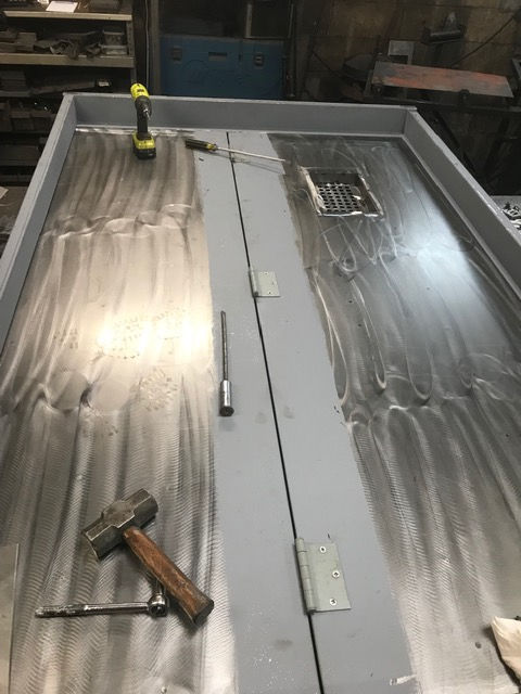 Elevator Swing Door Attached to a Stationary Panel
