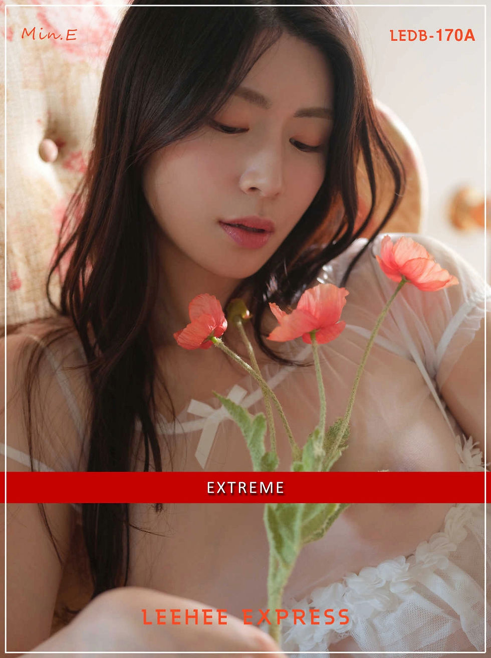 Close-up of 민e holding red flowers, nipple slightly visible.