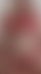 Jisamss posing in red bikini inside her Sydney room