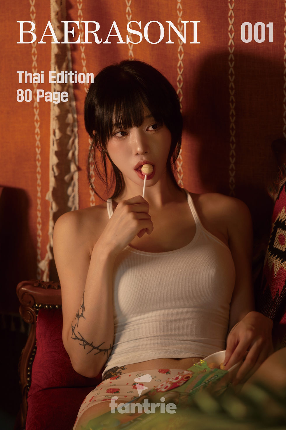 Baerasoni licking lollipop in white tank top for Thai Edition Fantrie cover.