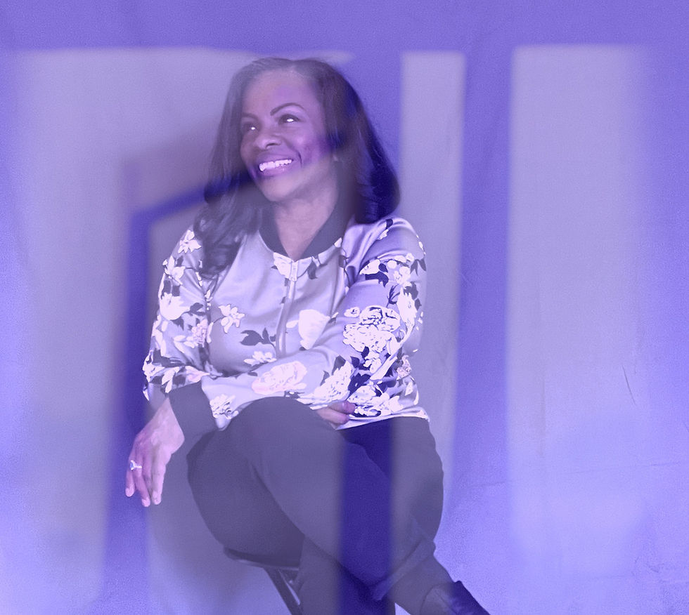Smiling woman sitting on stool