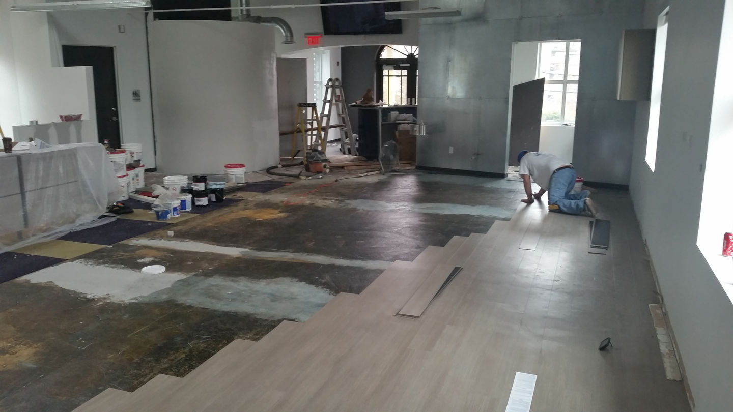 Installing flooring in classroom