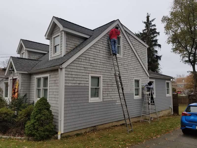 Painting exterior of a house in Darien ct