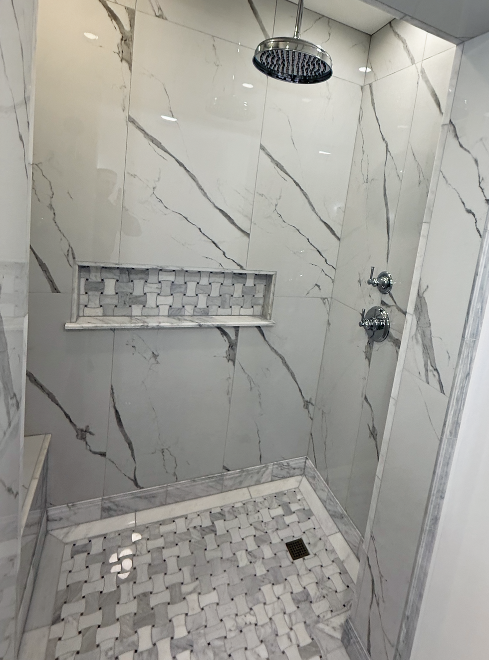 Luxury Curb-less Marble Shower Installation in East Tennessee