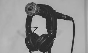 Pexels-Barthy Bonhomme-picture of headphone hanging on a microphone.