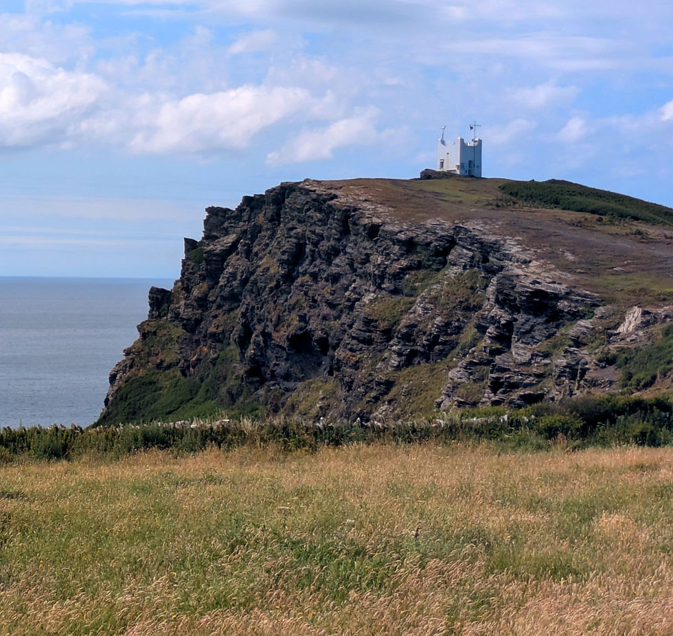 National Coastwatch lookout station on a rocky cliff top