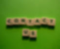 white and black dice on green textile_edited.jpg