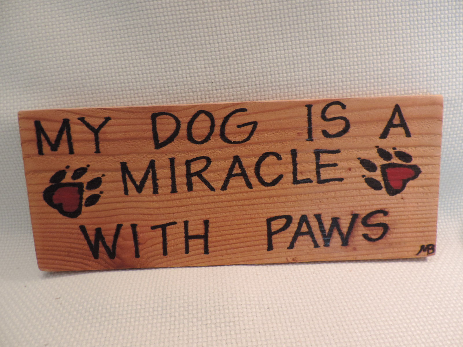"My Dog is a Miracle" hand painted sign