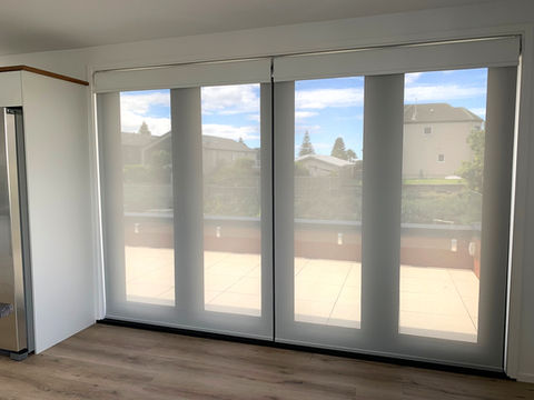 Motorised double roller blinds in living room