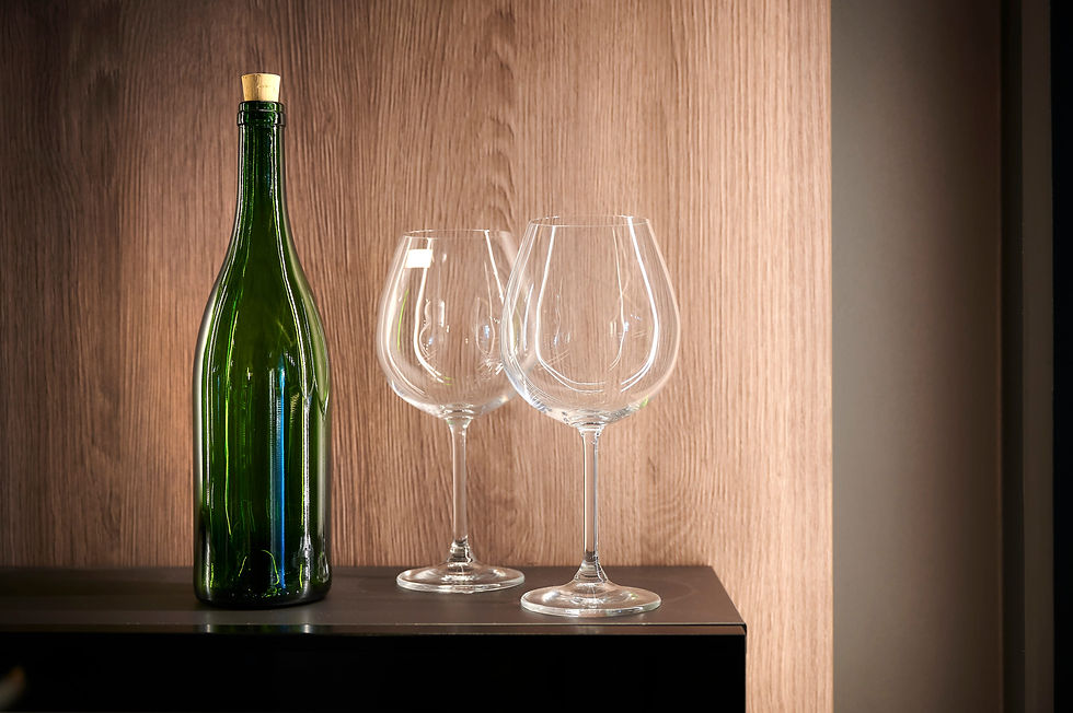 Detailed view of the Senza wine rack with bottles placed horizontally on minimalist wooden supports against a dark, textured