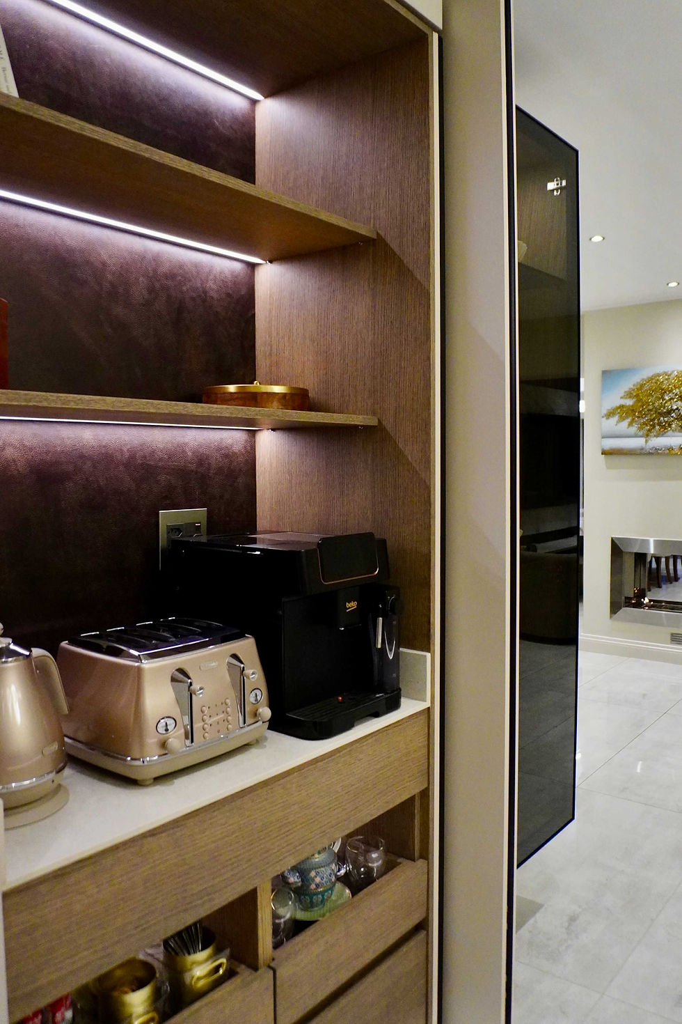Stylish contemporary kitchen in Centurion, South Africa, featuring handleless beige cabinetry