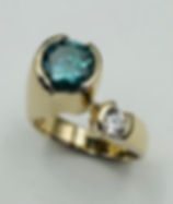 Blue treated diamond with white accent diamond ring in 14k yellow gold