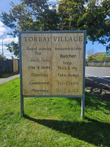 Router engraved wooden sign restored for Torbay community