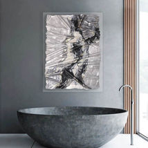 Hand-sculpted monochromatic abstract resin artwork with gold highlights mounted on a clear acrylic base