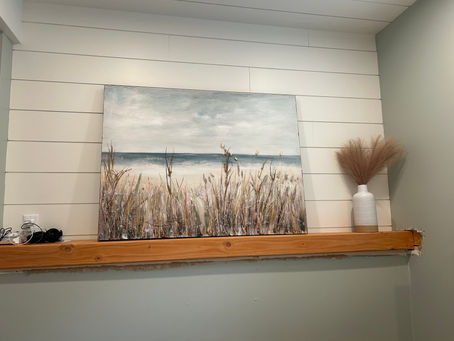 wall with white shiplap and wood beam needing drywall cleanup