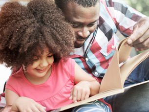 The Power of Print: Why Physical Books and Materials Matter in Children's Lives