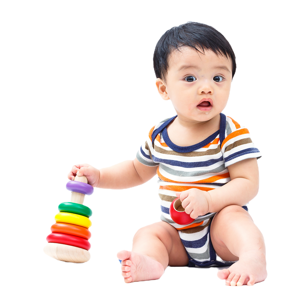 A baby playing with stacking rings.