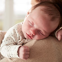 close-up-of-sleeping-newborn-baby-sleeping-on-moth-2023-11-27-05-23-36-utc (1).jpg