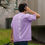 Thumbnail: Man in lavender Chinese calligraphy oversized tee