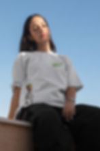 Woman models Baby Groot T-shirt