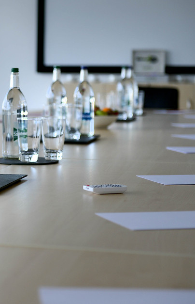 A conference room with water bottles.
