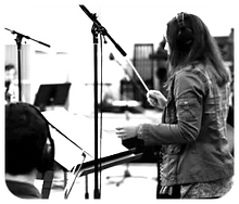 Kate Diaz orchestra conducting original music at Berklee