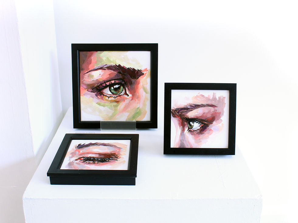 Thumbnail: Gallery display featuring three Eye Study series original eye paintings in black frames