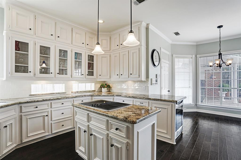 white kitchen and tan granite countertops