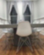 Study room - Eames chairs, concrete table & light gray drapes