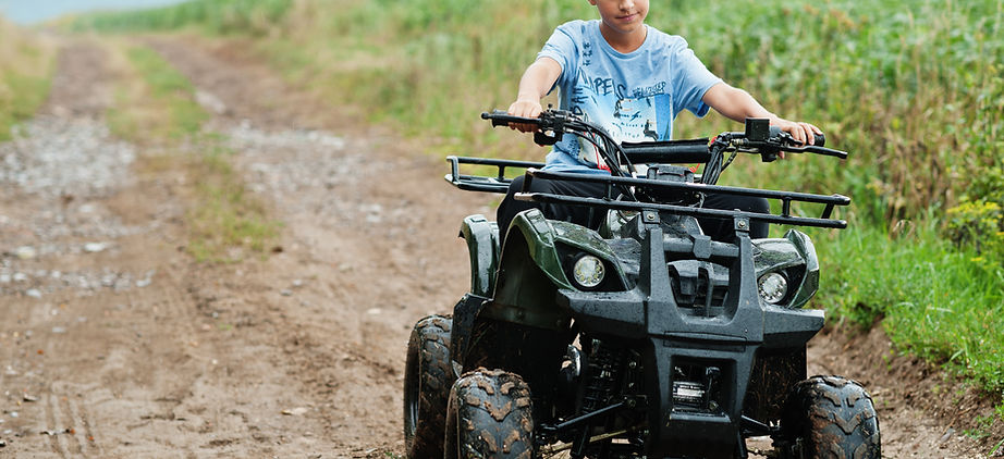 boy-drive-fourwheller-atv-quad.jpg