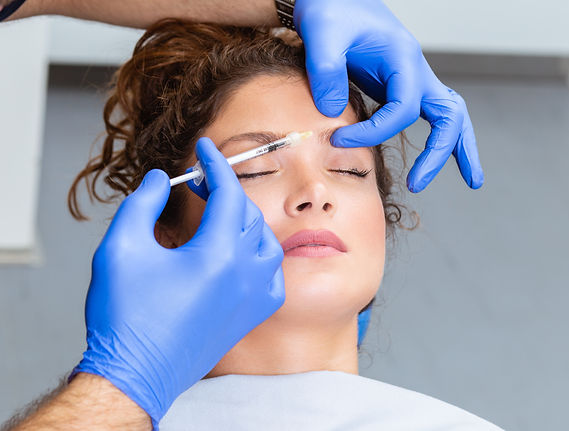 Woman getting Botox injected