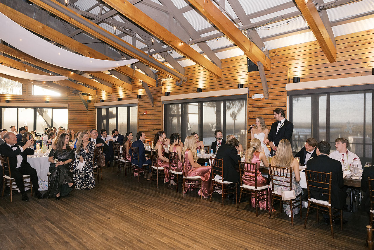 Newlyweds celebrating with guests at Omni Amelia Island Resort