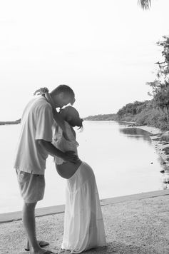 Fine art family maternity session capturing intimate connection at Washington Oaks Gardens State Park