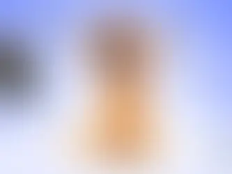 small puppy with its mouth open showing teeth while dental exam tools float around its head