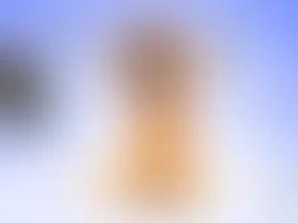 small puppy with its mouth open showing teeth while dental exam tools float around its head