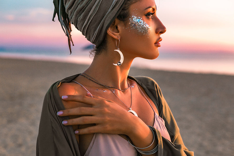 beautiful young fashion model on the beach at sunset portrait.jpg