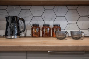 contemporary kitchen with hexagon marble tiles, black ceiling. kitchen design ideas. HMO design ideas