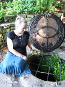 Me beside the Chalice Well, the Red Well, in the Chalice Well House Gardens